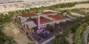 Buildings with a red roof surrounded by trees