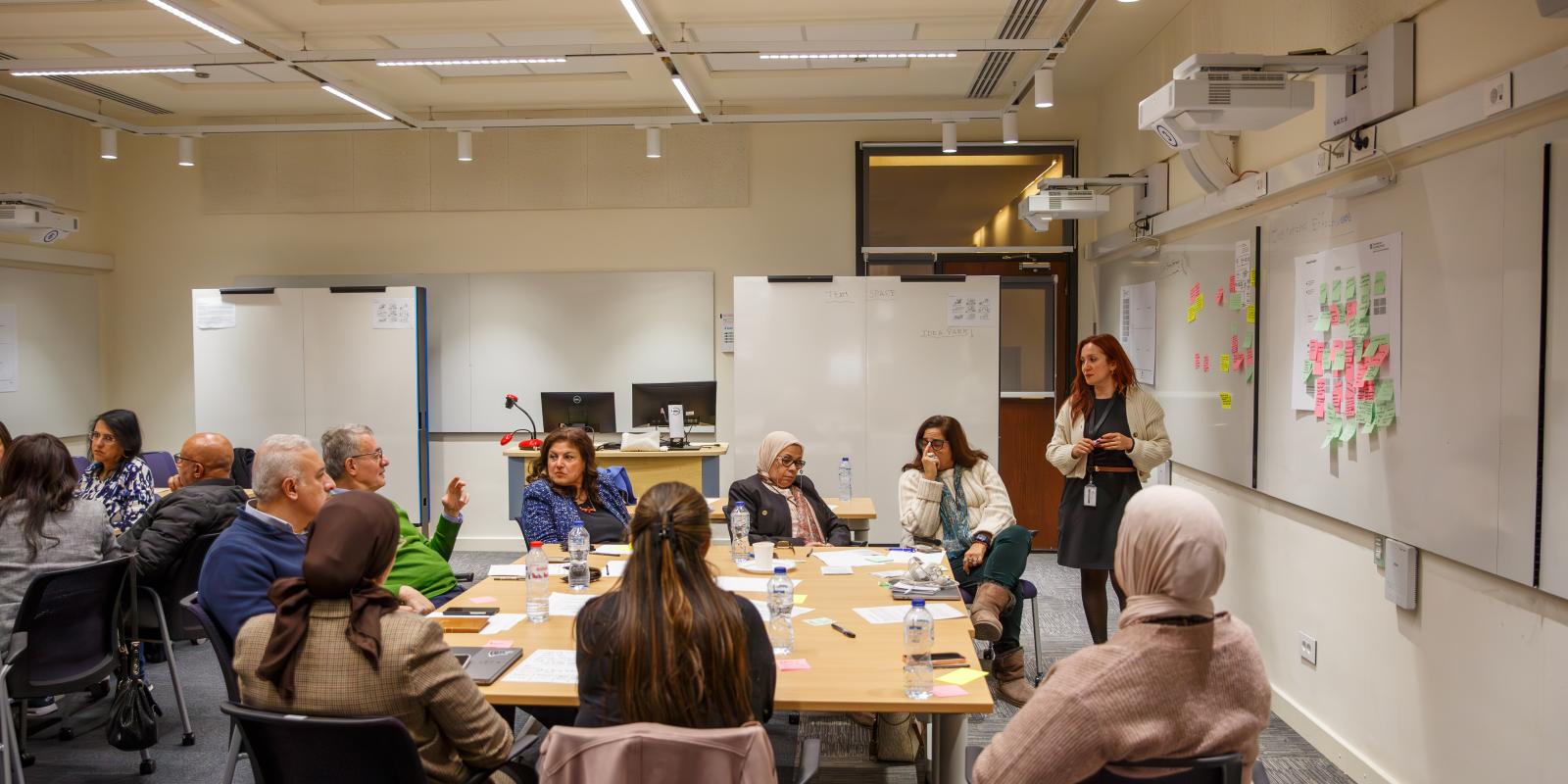 faculty taking a workshop