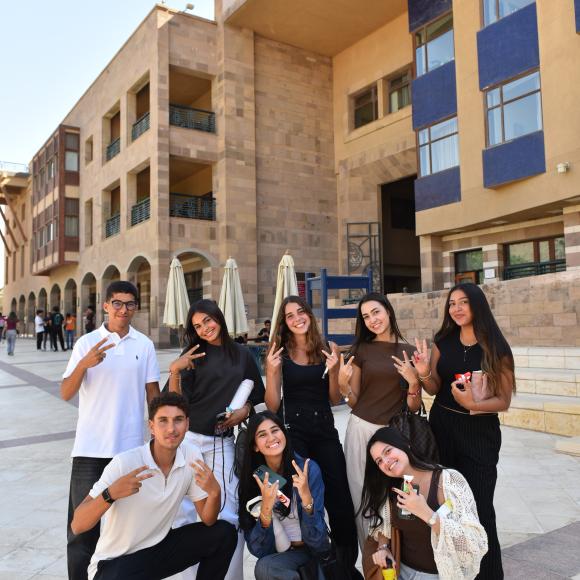 auc girls and boys taking a group picture