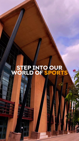 Picture of a building, Text reads "Step into Our World of Sports"